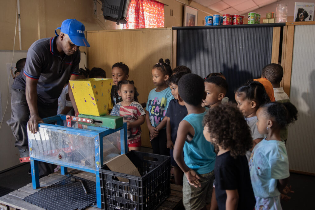 Children learning about recycling and environmental care through the ACP365 Eduearth programme