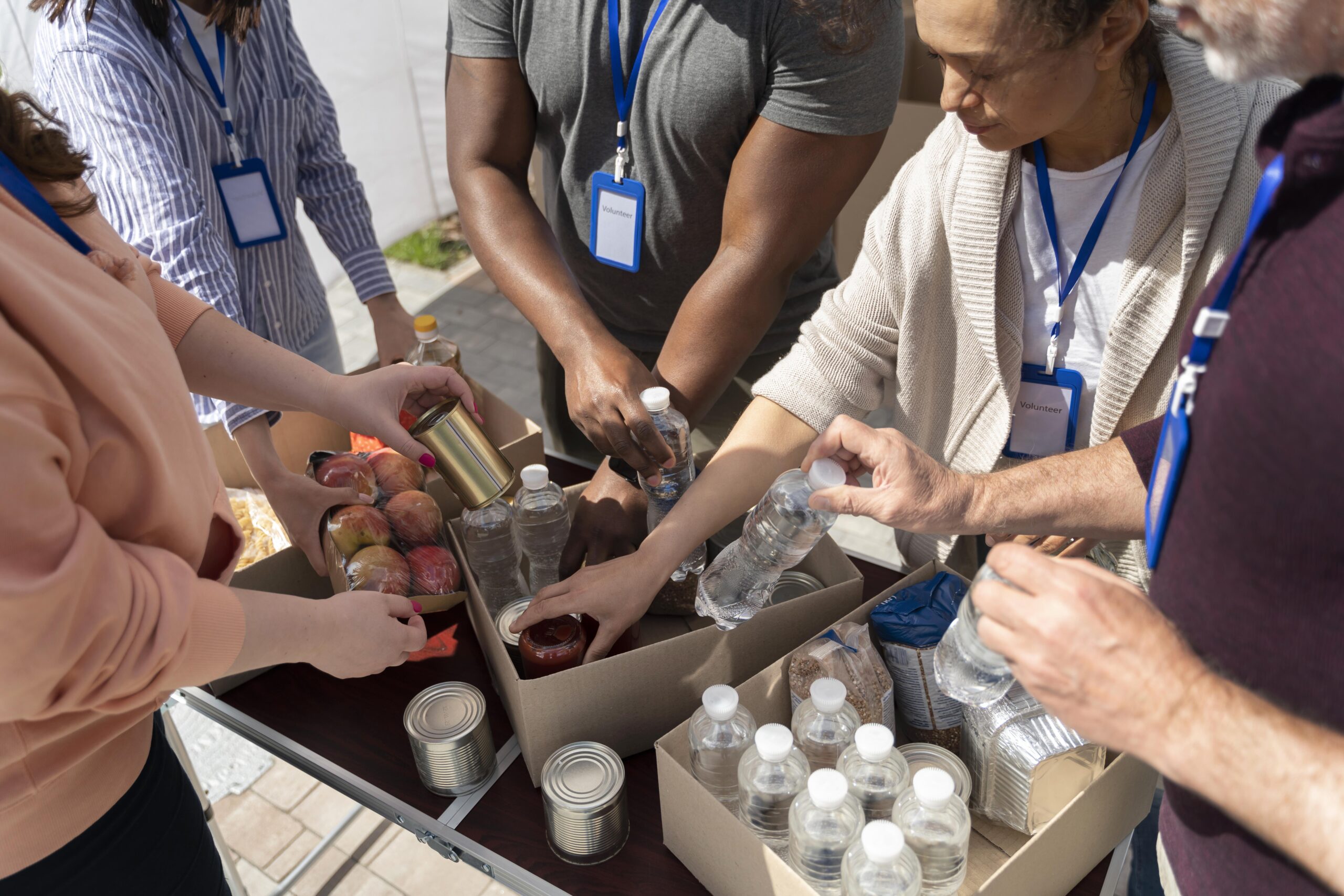 Volunteers preparing supplies for community support activities