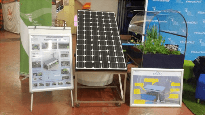 Exhibition display showing the solar-powered aquaponics system design and components